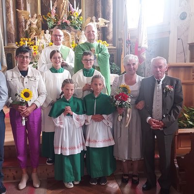 Die Pfarrei Afers Früchte reifen an der Sonne, Menschen durch die Liebe